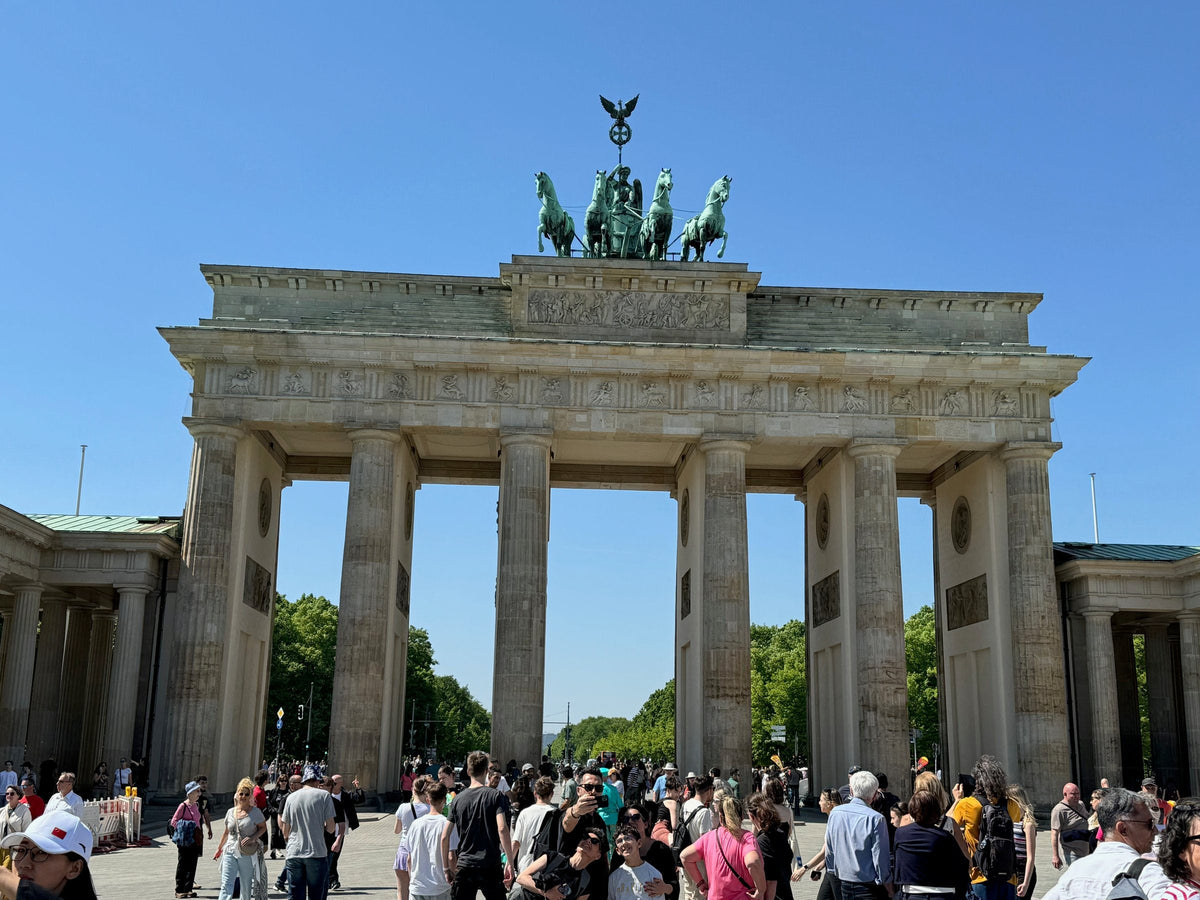 The Brandenburg Gate under a blue May Day sky