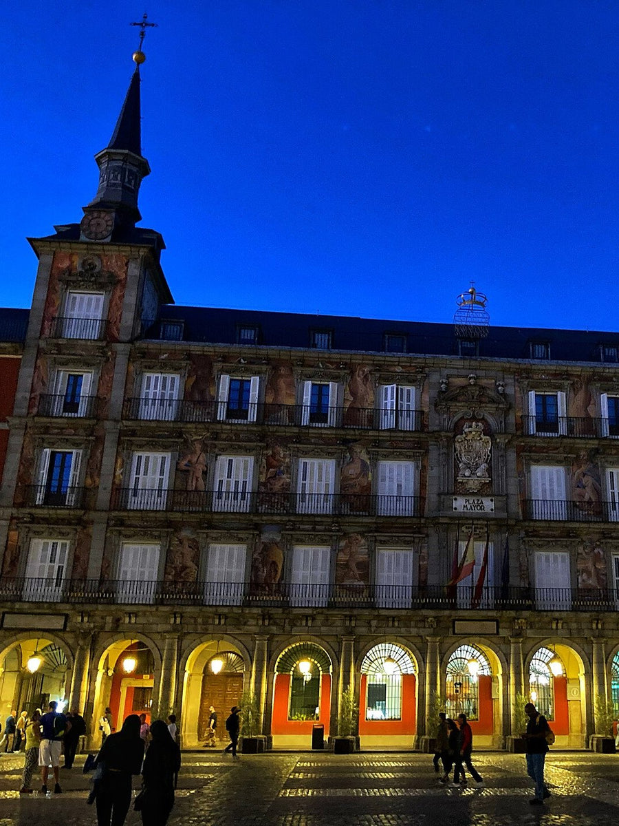The painted Casa de la Panadería on Plaza Mayor, Madrid, at dusk